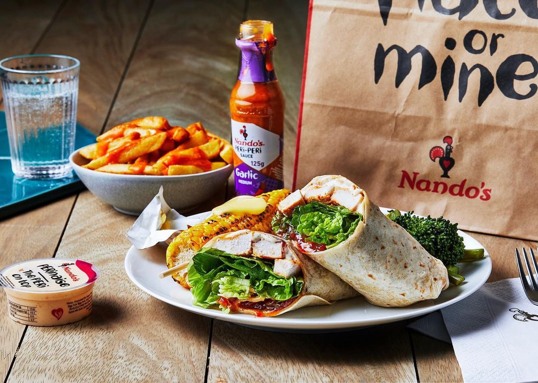 plate of chicken at Nando's with garlic sauce.