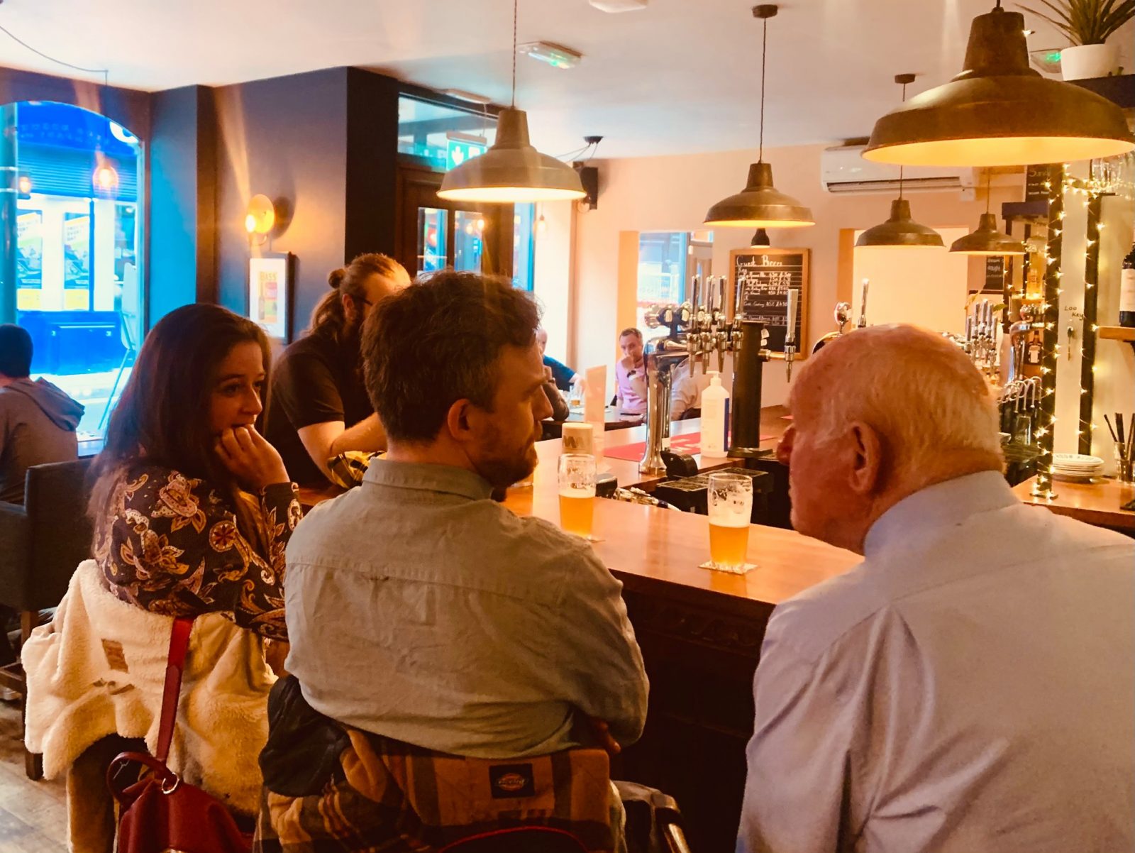 People sat at the bar.