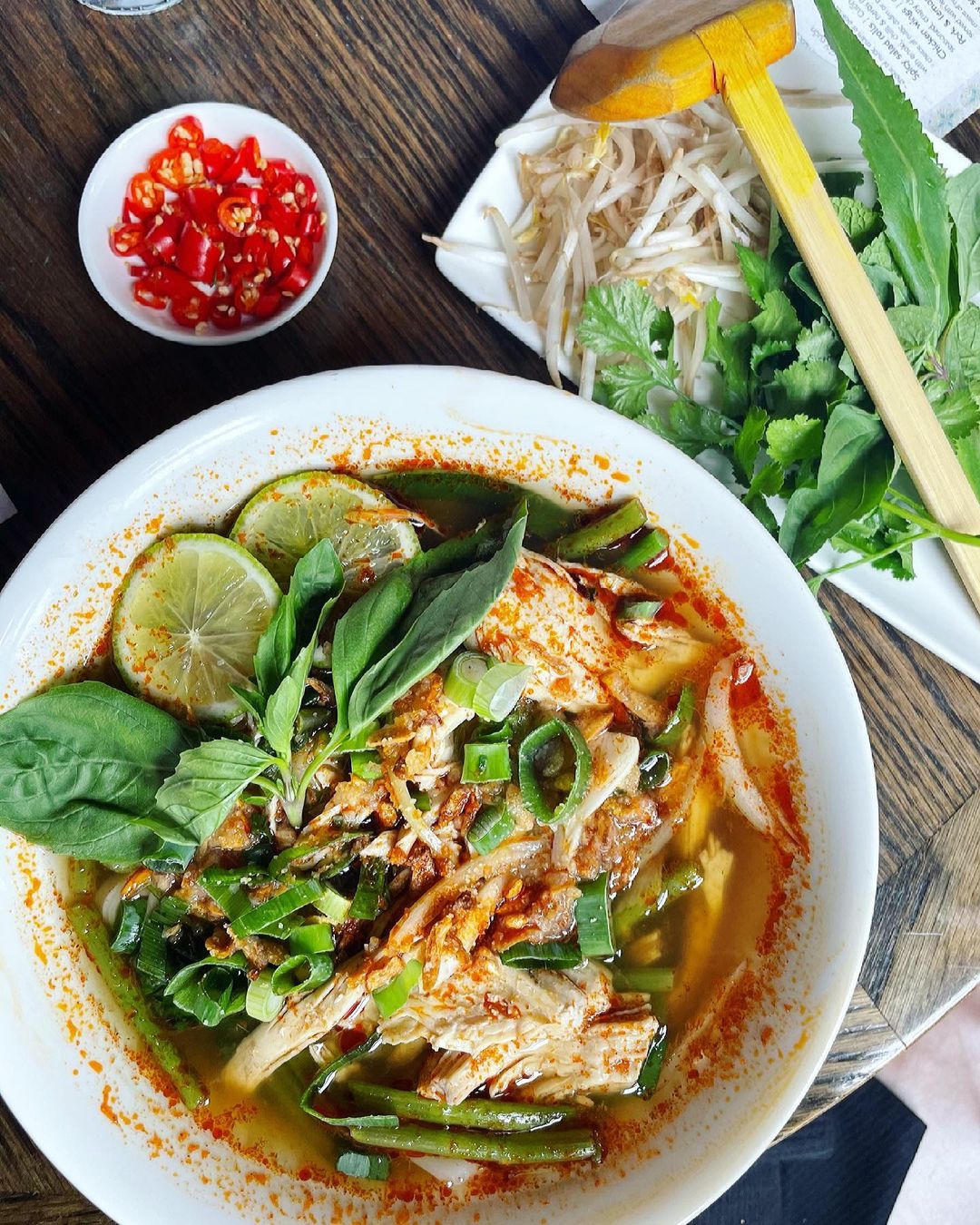 Spicy green noodle soup from Pho restaurant.