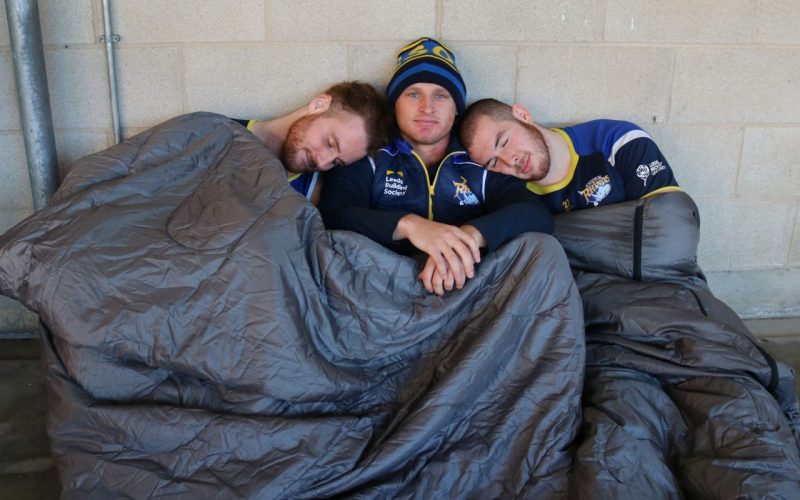 Leeds Rhino players in a sleeping bag