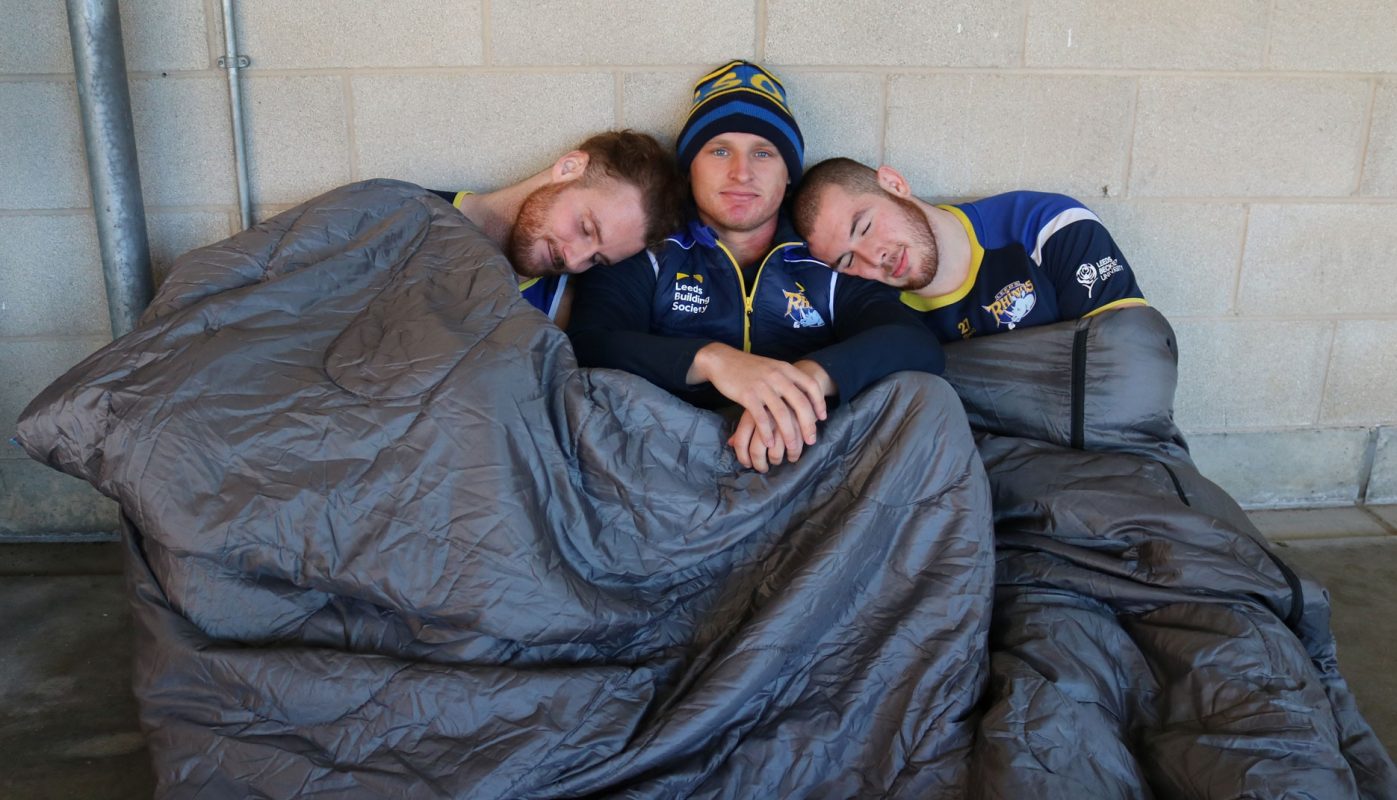 Leeds Rhino players in a sleeping bag
