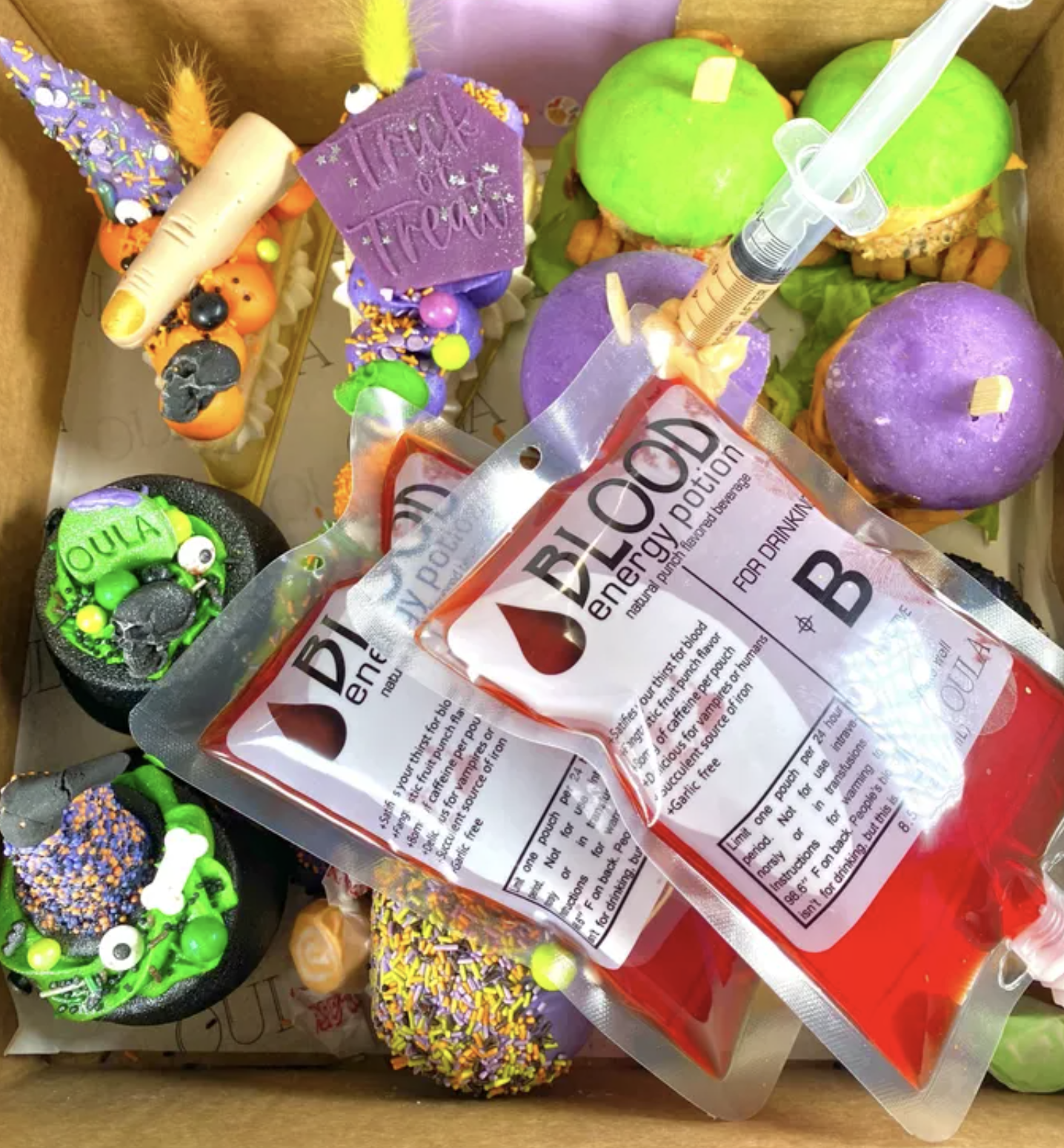 Oula Halloween box with cakes, sliders and fake blood