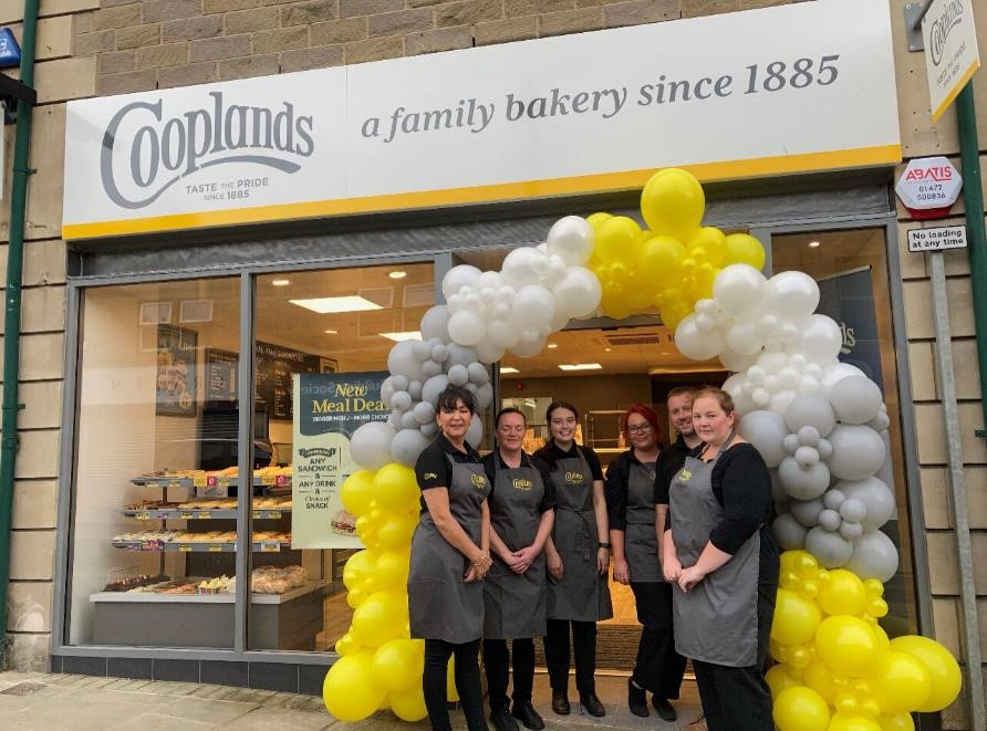 Staff stood outside new Cooplands store in Yeadon, Leeds