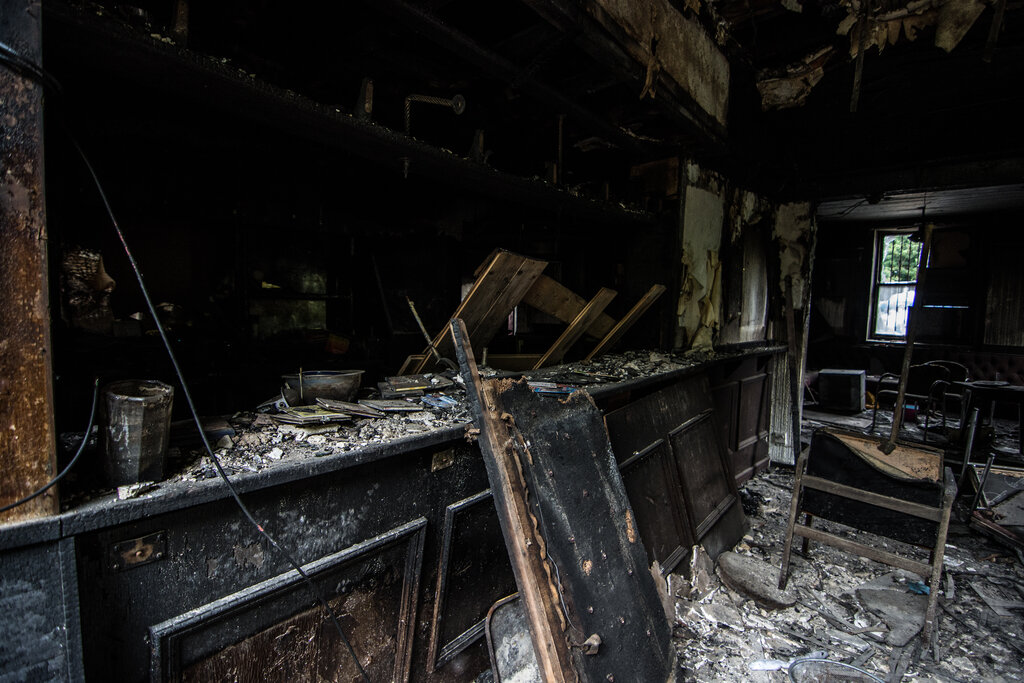 inside the derelict pub with dust and dirt everywhere