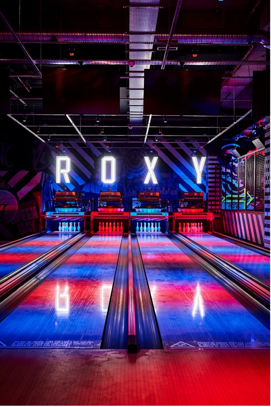 bowling alley with R O X Y letters spaced out above the wall