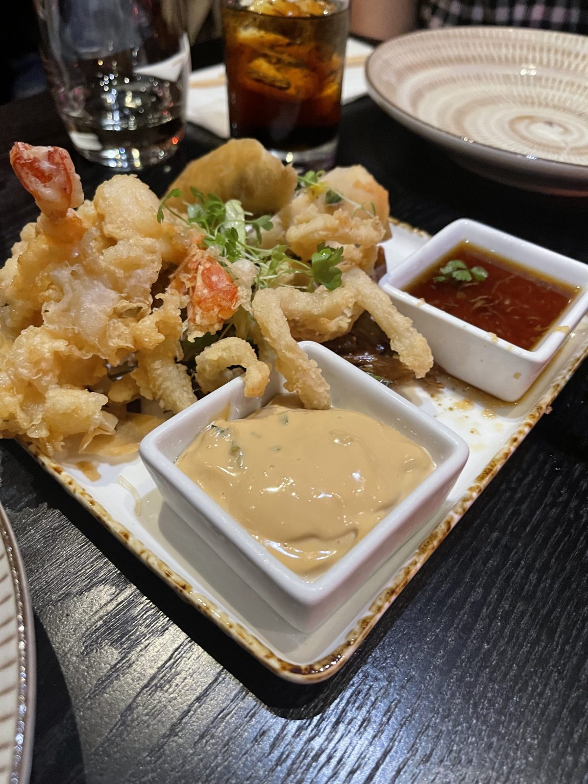 Sakku seafood dish with dipping sauce