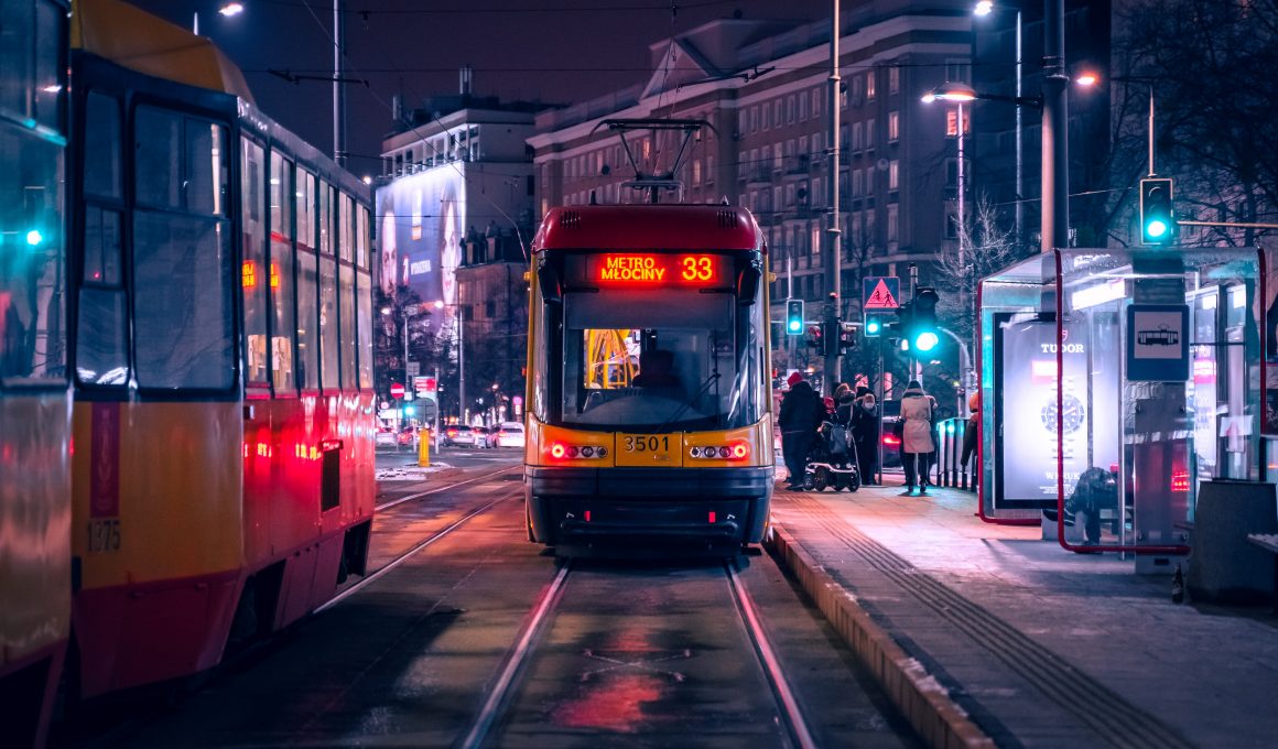 trams at night in a city