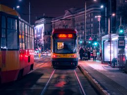 trams at night in a city