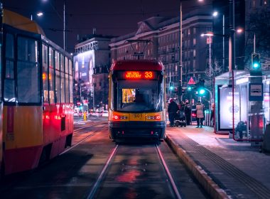 trams at night in a city
