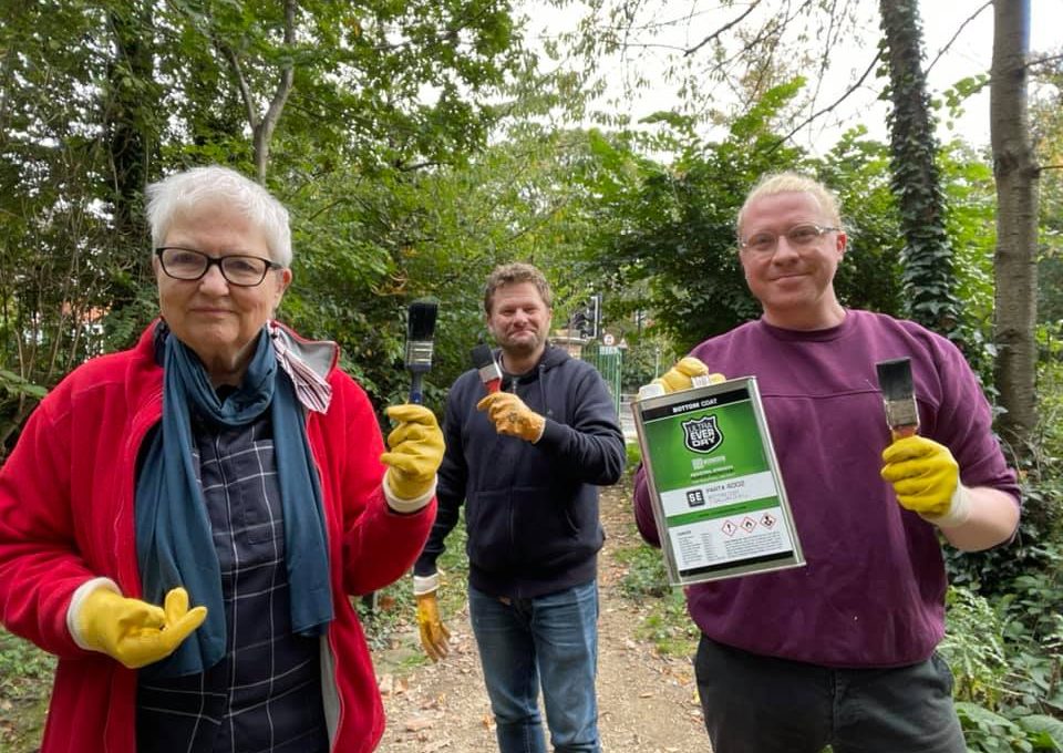 community with paint brushes