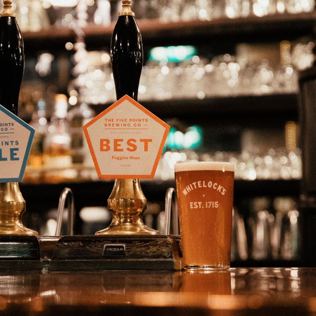 beer with whitelock's logo on next to beer pump.