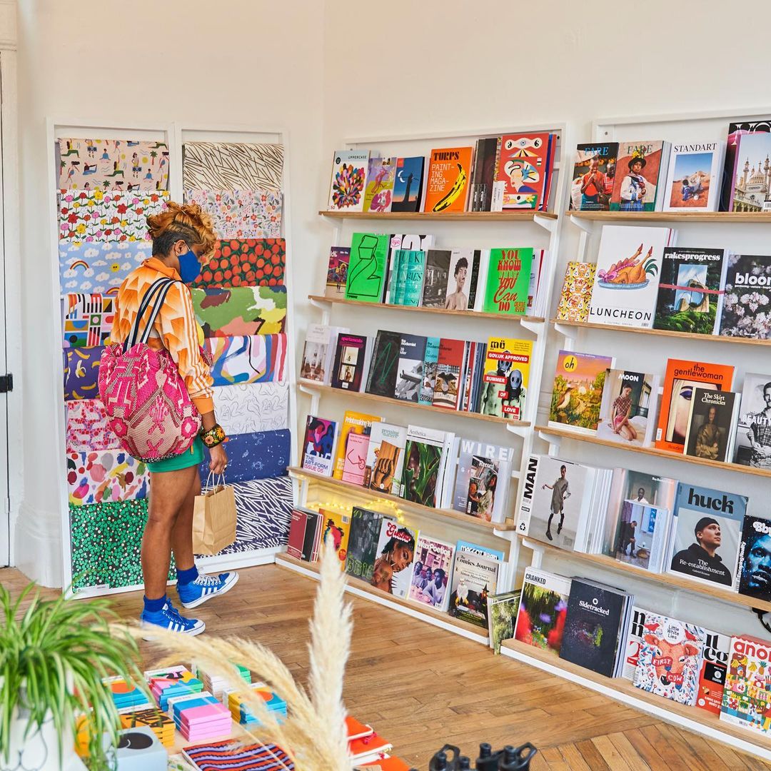 person looking at books.