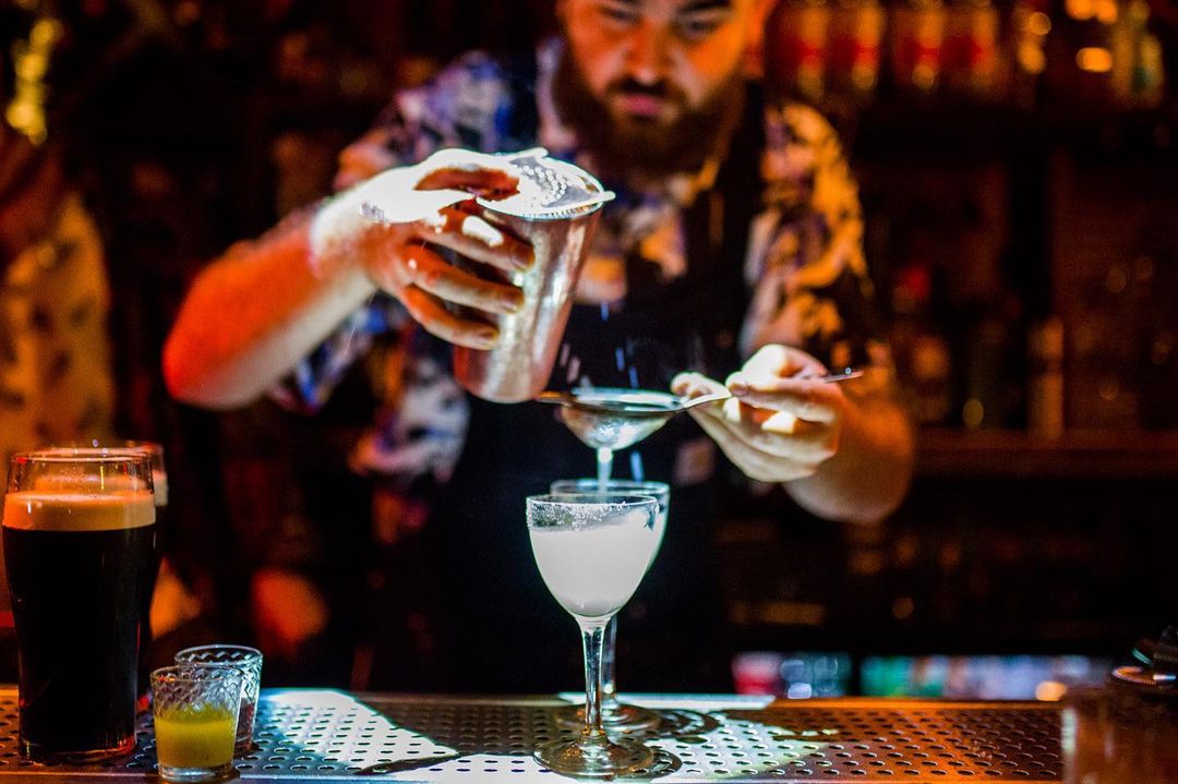bartender making cocktails.