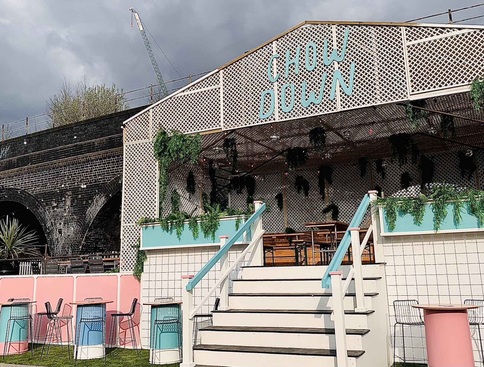 beer garden terrace with pastel signs.