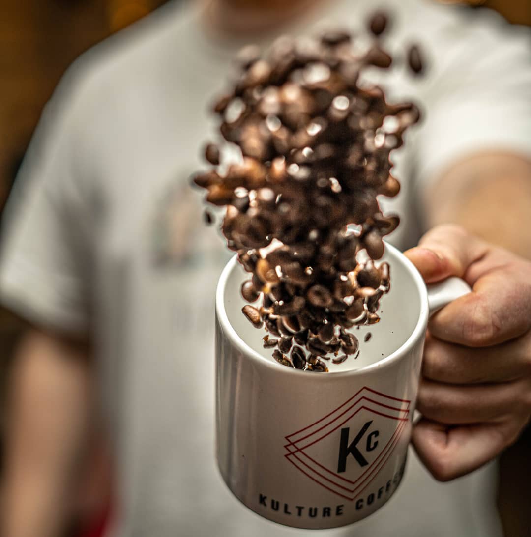 Coffee beans in a mug at Kulture Coffee.