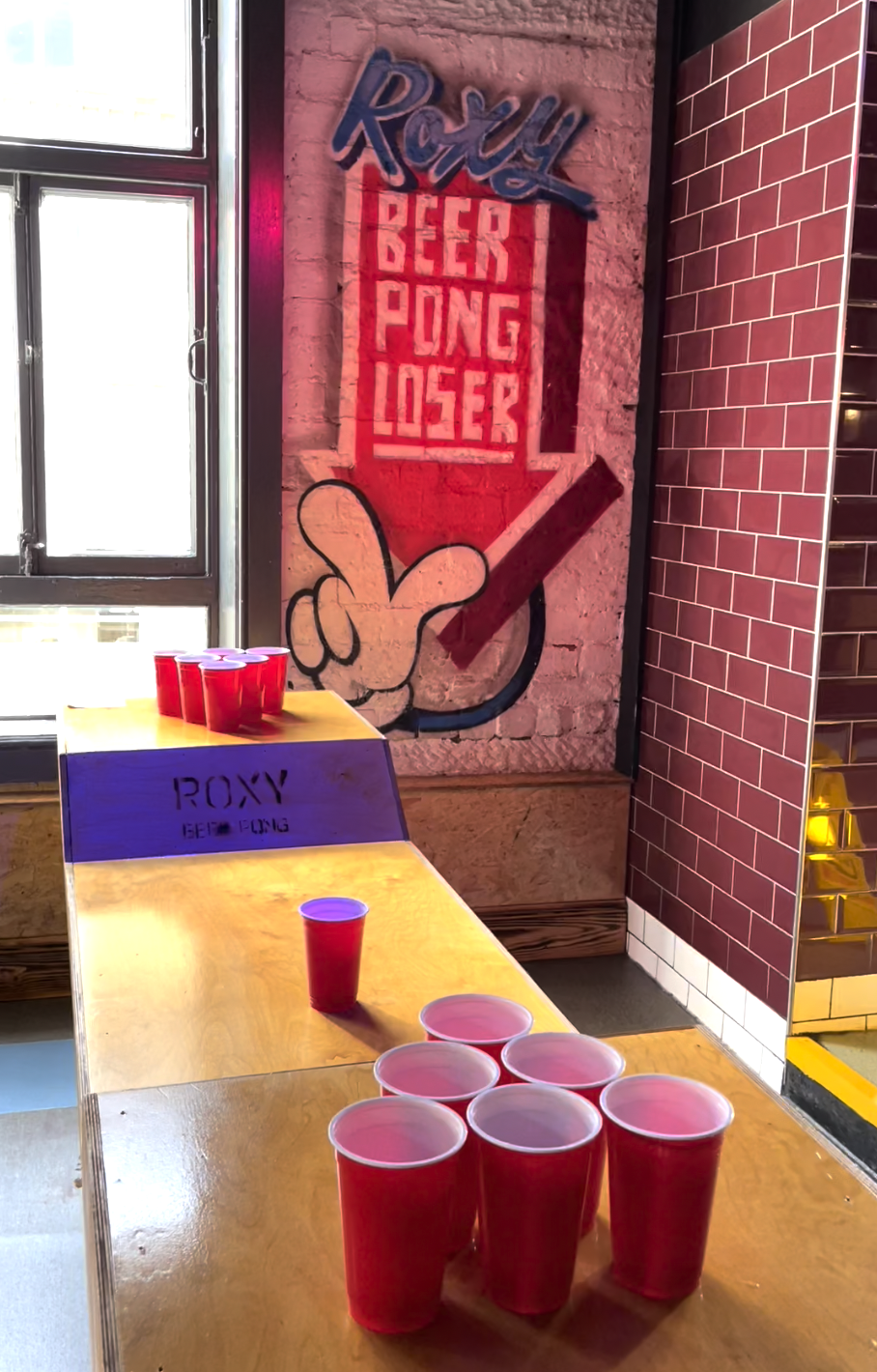 beer pong set up with red cups.