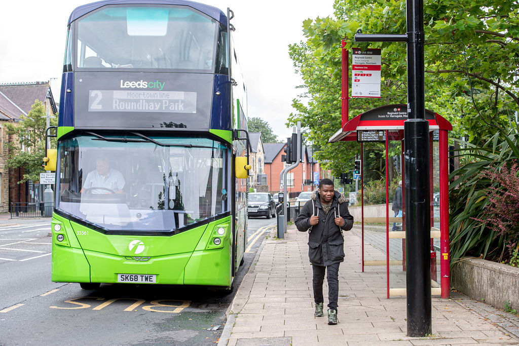 bus stop with bus.