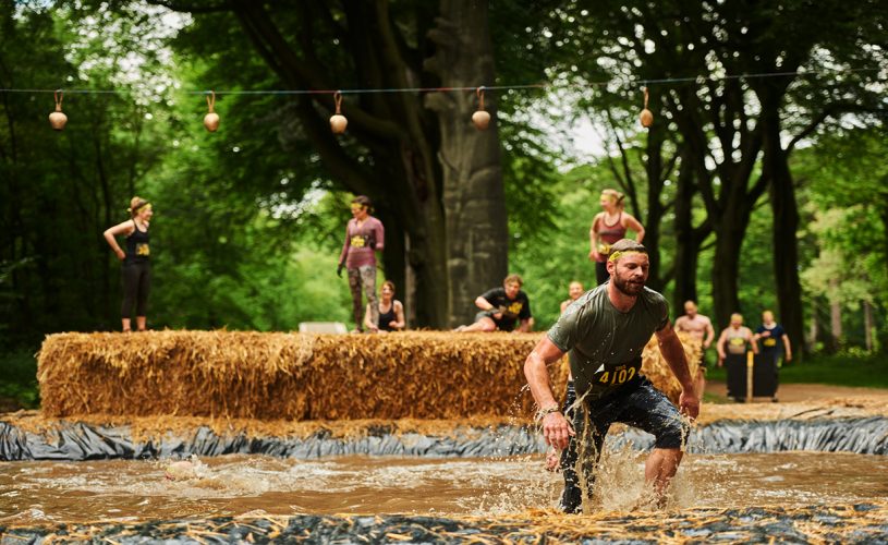 Contestants completing the obstacle course at Total Warrior.