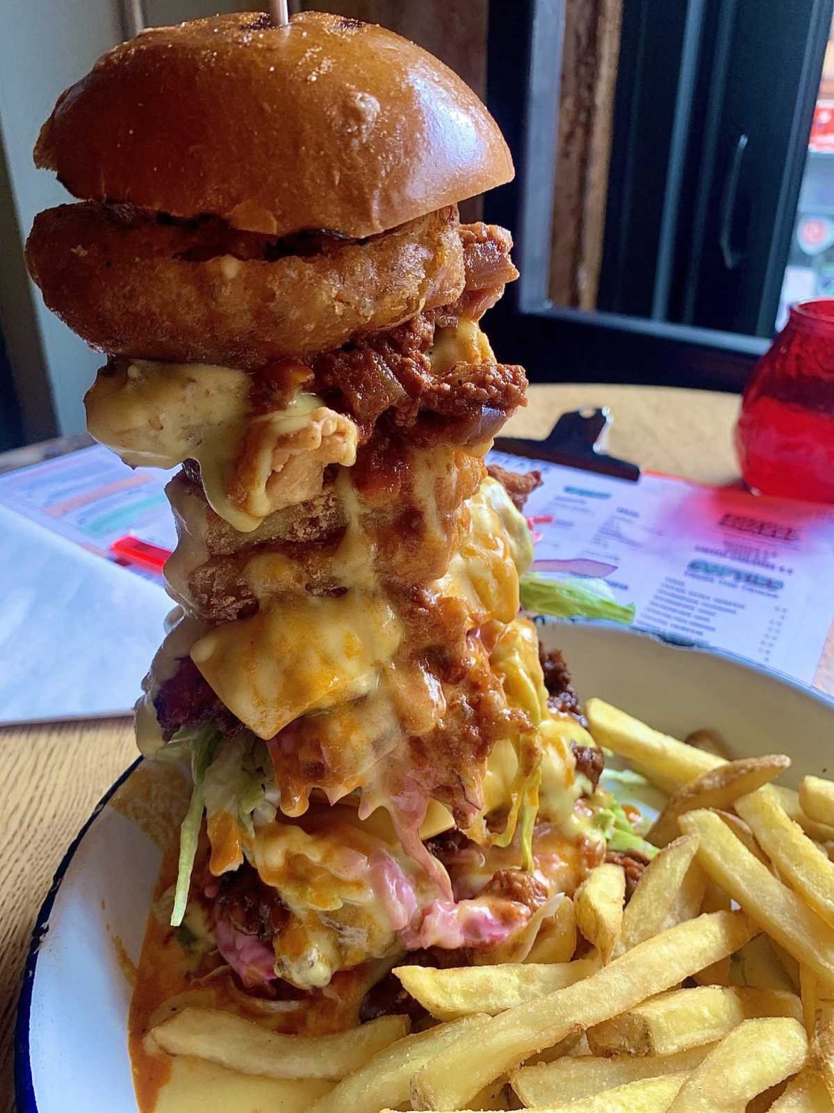 giant burger with fries.