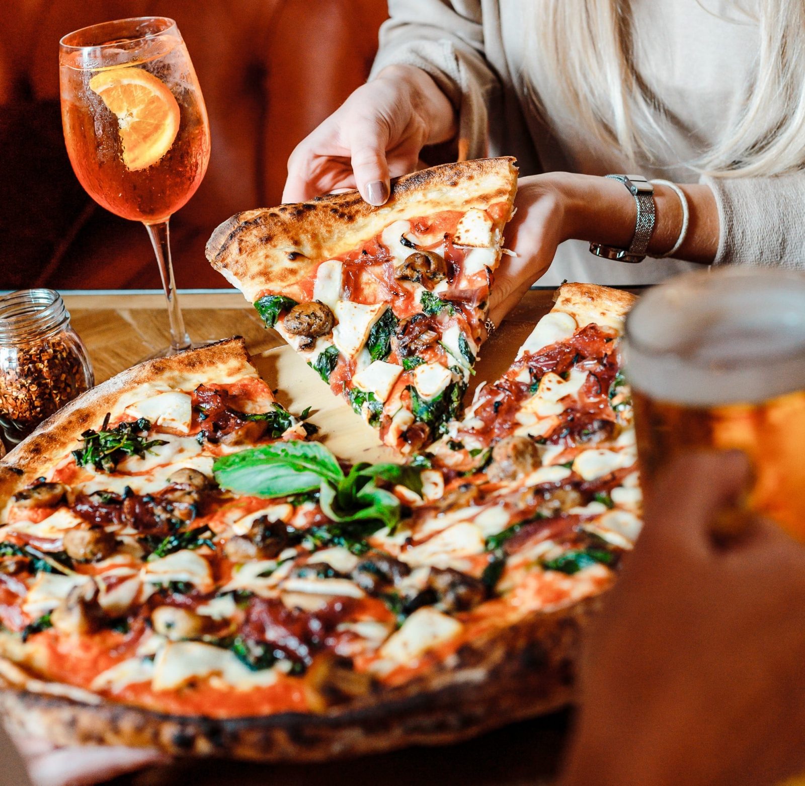 A pizza being shared at Box Bar Leeds. 