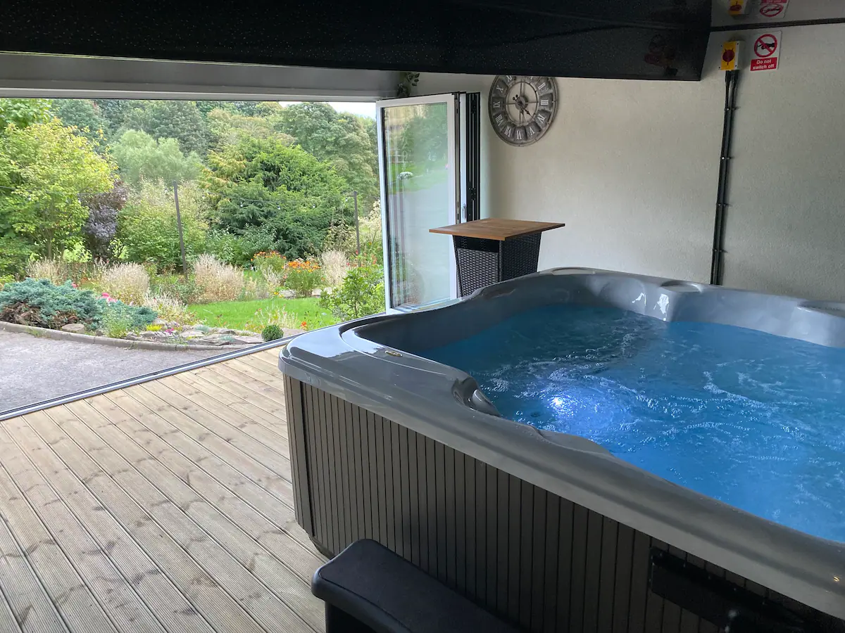 The hot tub inside the Airbnb.
