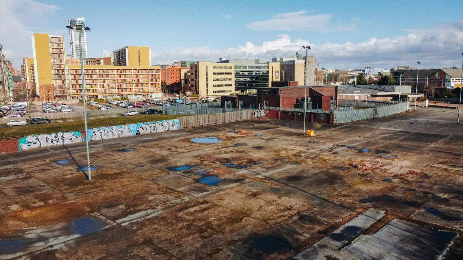 building in background of construction site.