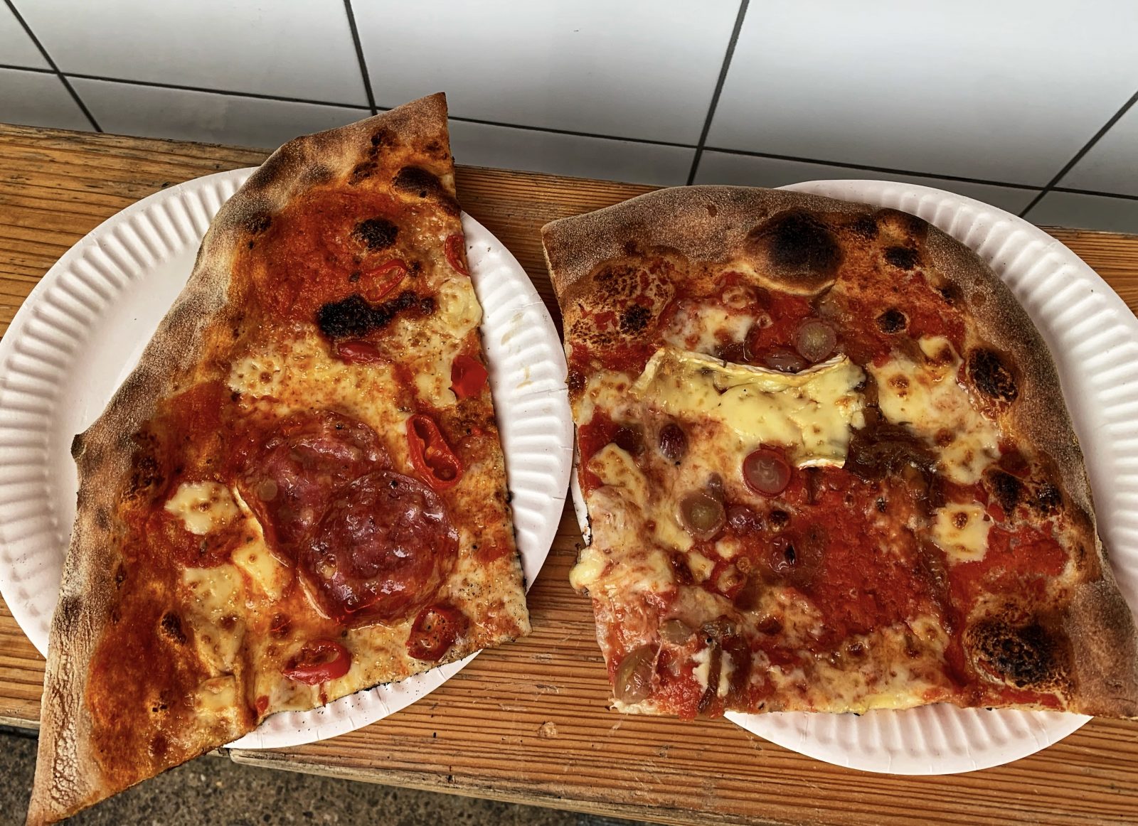 two slices of pizza at Dough Boys