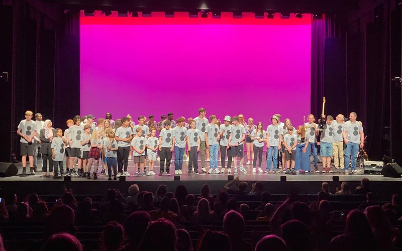 children stood on stage.