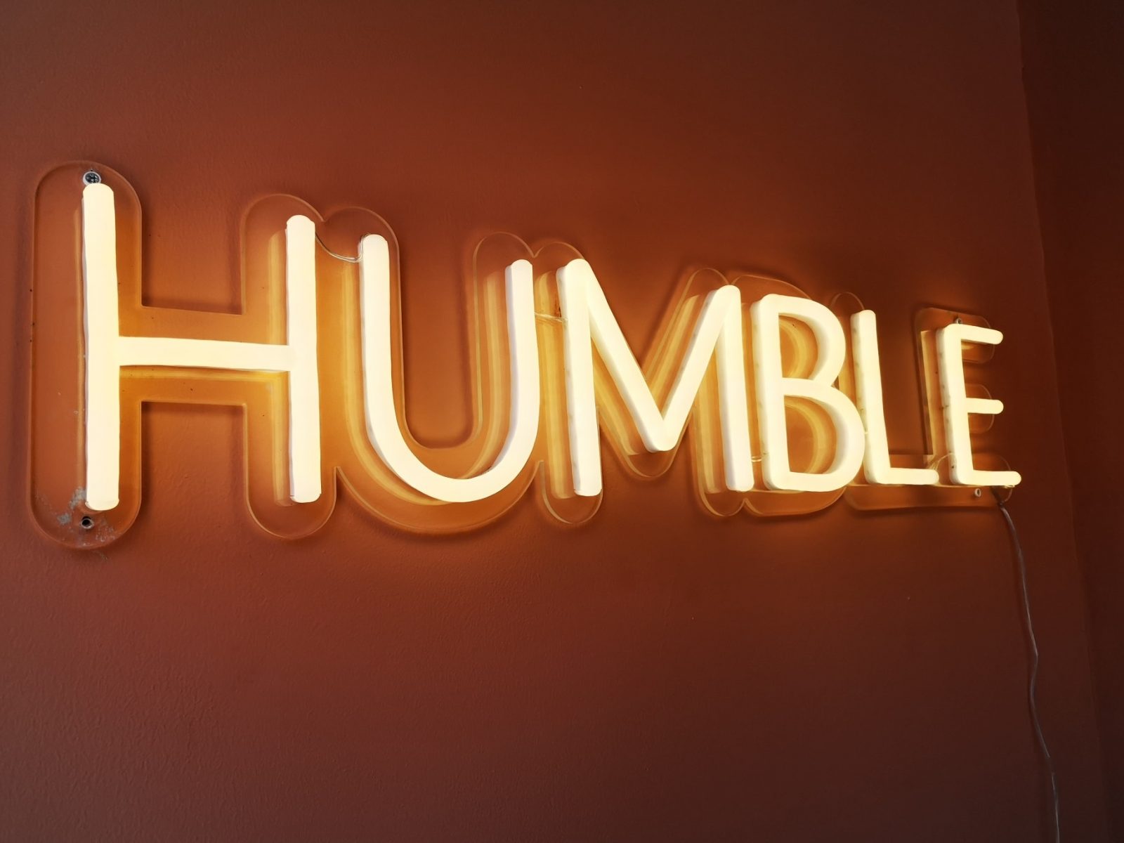 A neon sign that says 'Humble'. 