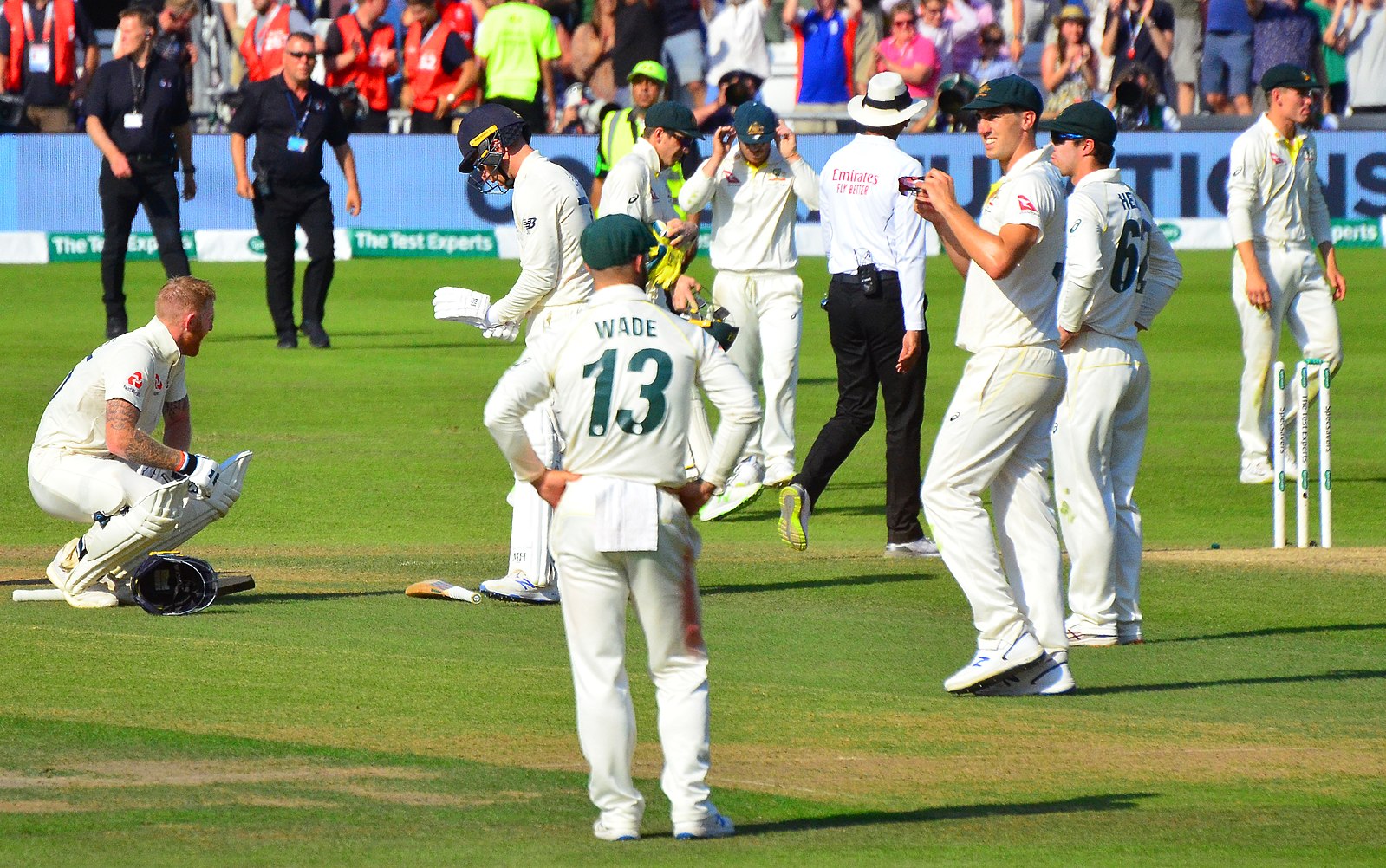 England's Ben Stokes on his haunches, taking in the victory over Australia, on Day 4 of the 3rd Test of the 2019 Ashes at Headingley