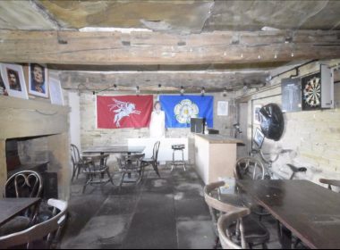 This Yorkshire cottage has a basement bar with shrine to VERY unlikely celebrities