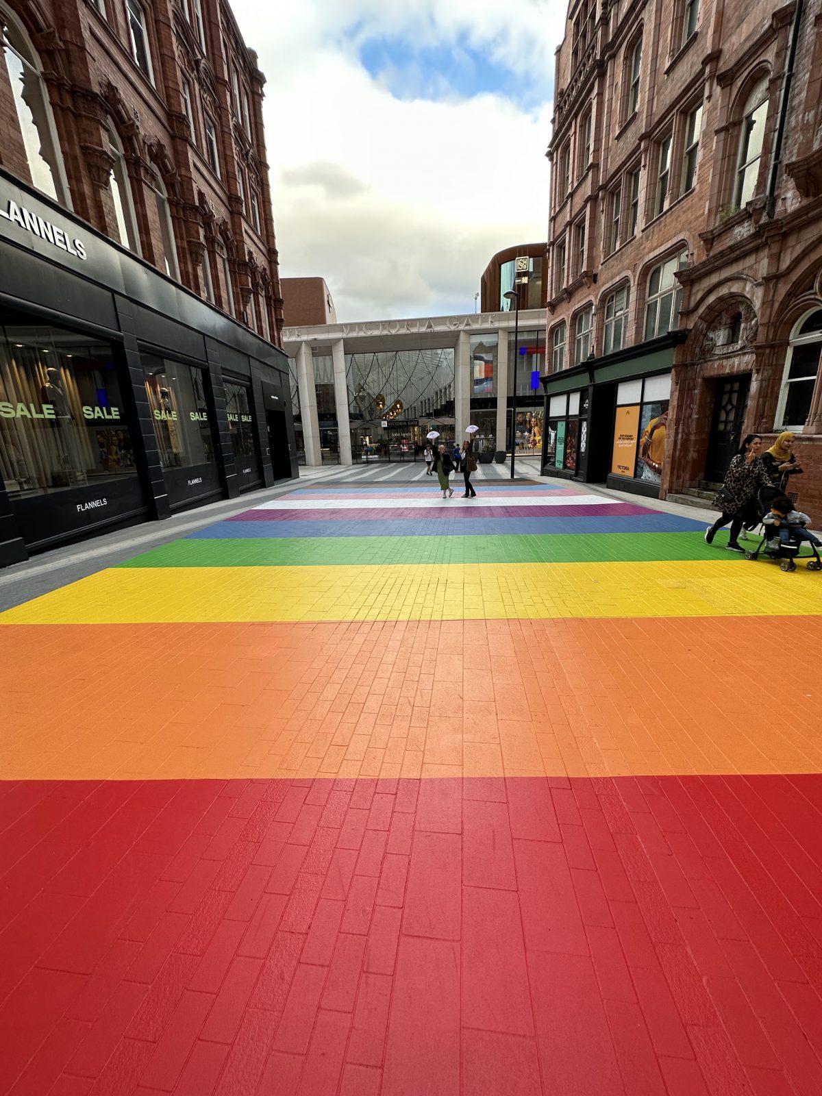 A rainbow flag mural. 