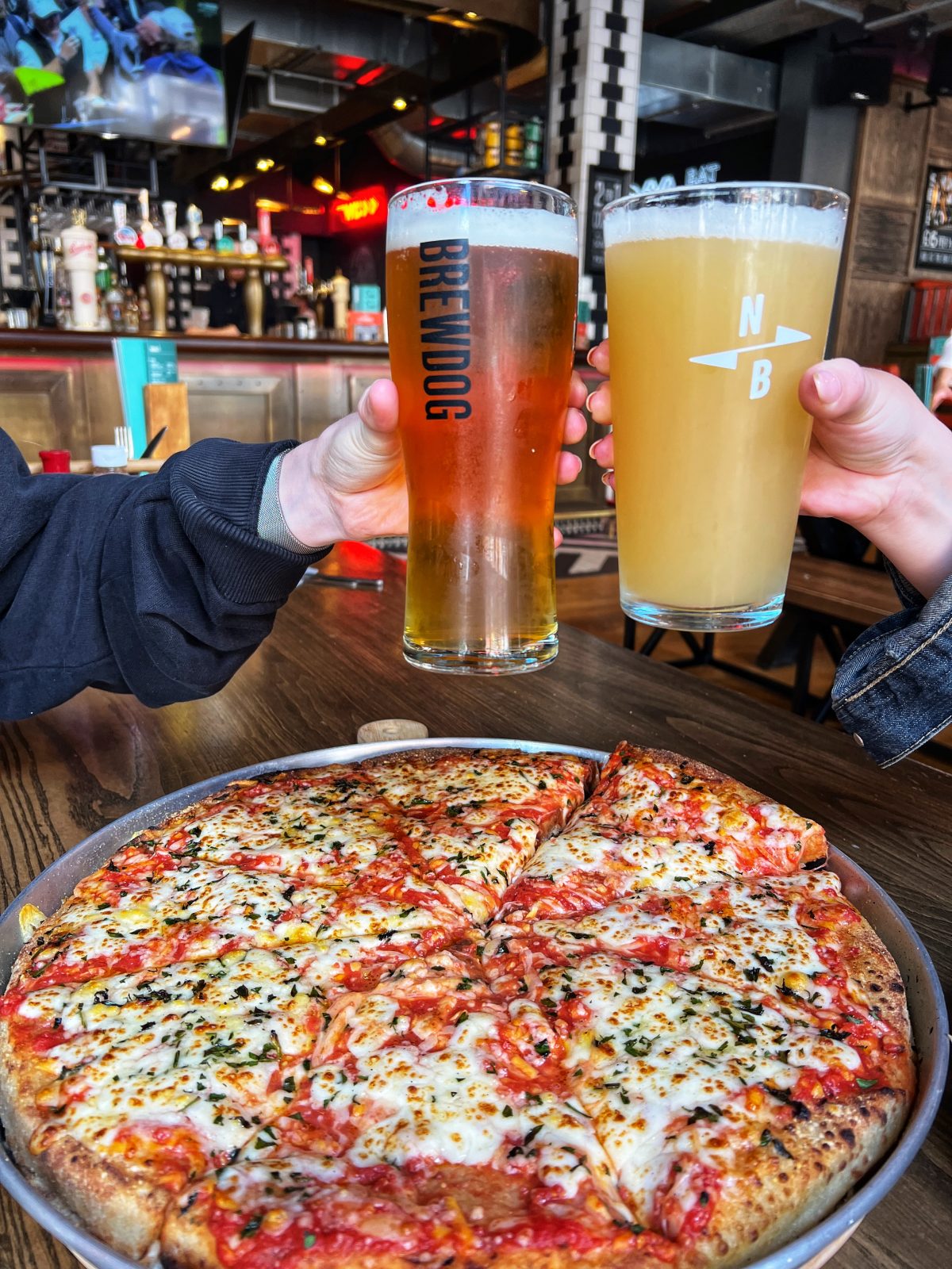 A pizza and two pints. 