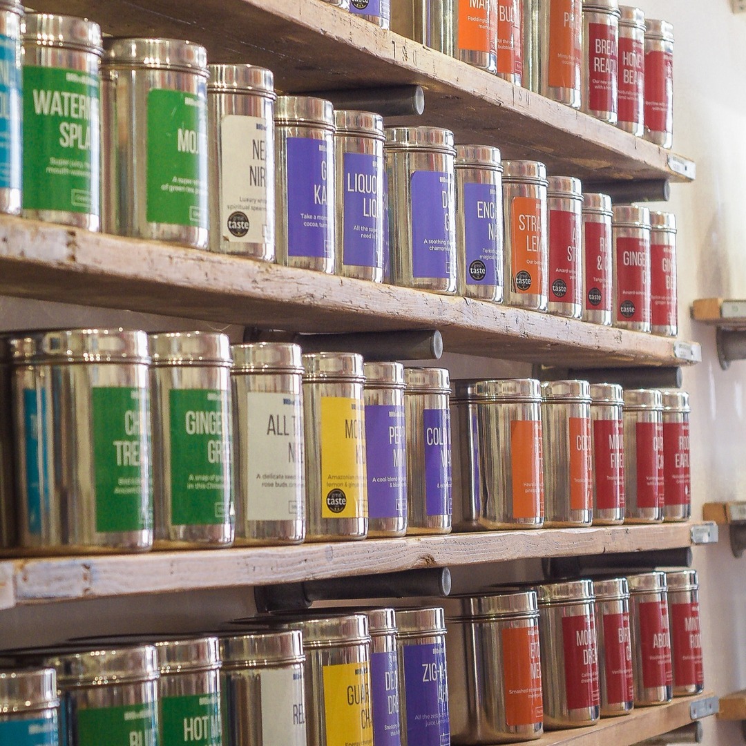 A selection of teas on a shelf.