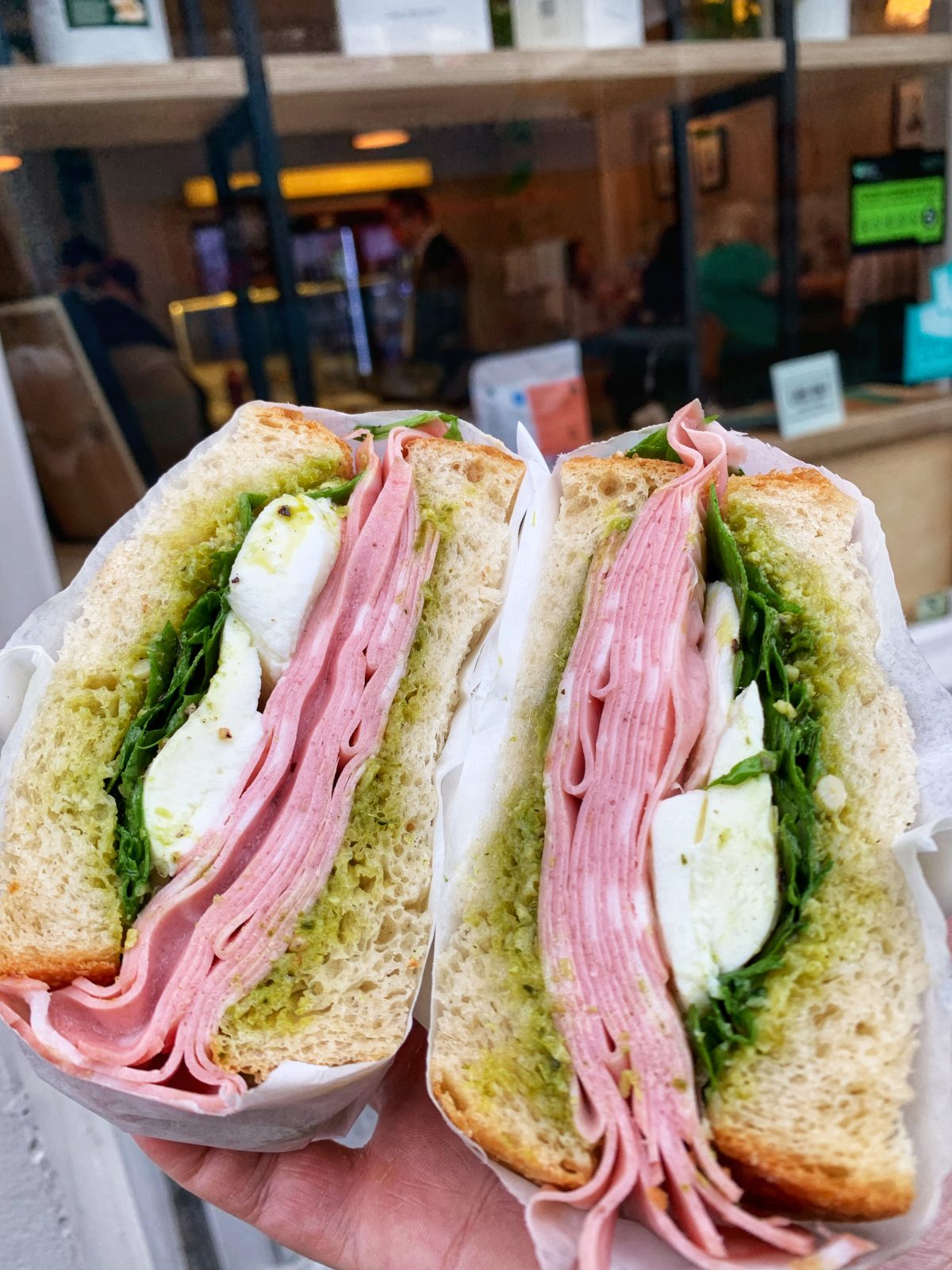 Pistachio Mortadella, Mozzarella, Pesto & Rocket sandwich.