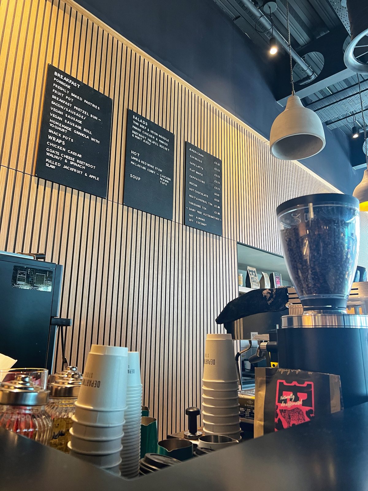 coffee machine with lots of coffee cups.