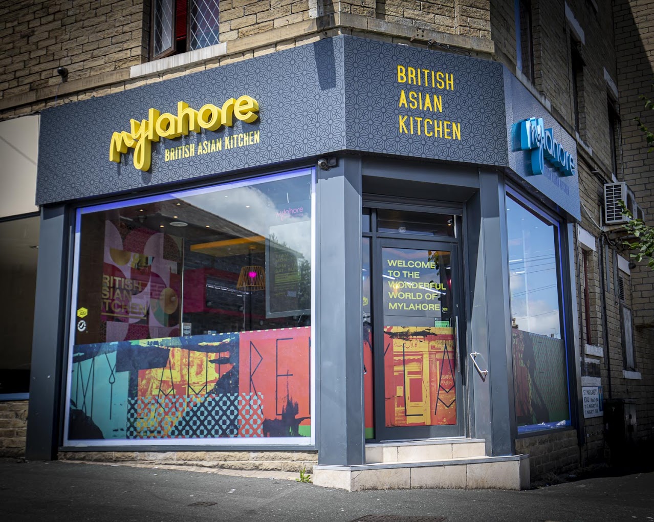 MyLahore building with sign that says British Asian Kitchen on the front door.