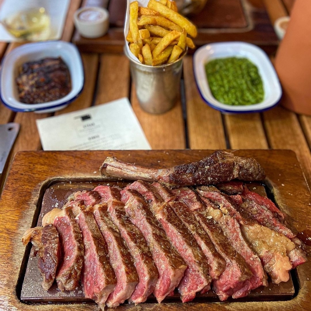 tomahawk steak on a plate.