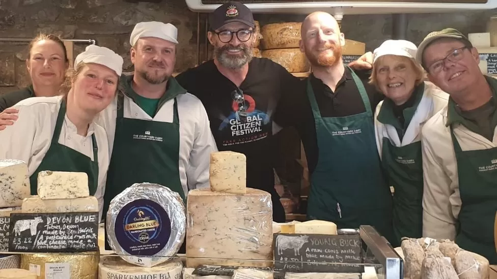 Hugh Jackman in a cheese shop. 