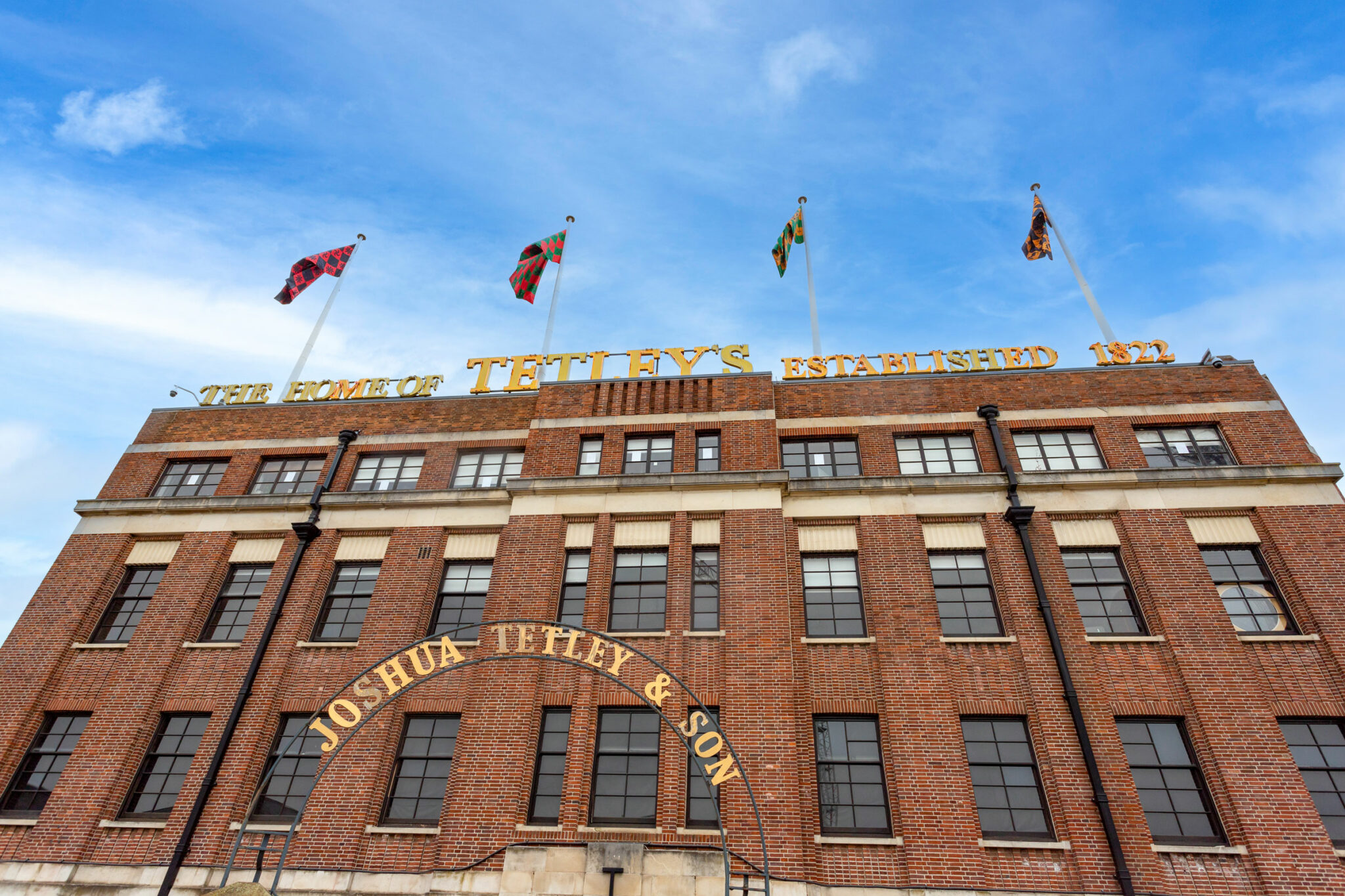 The Tetley building with brickwork and gold sign