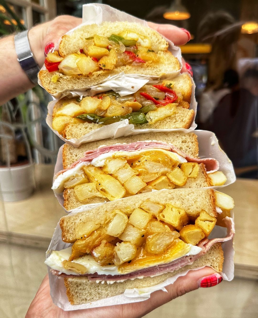 Two chip sandwiches stacked on top of each other. 