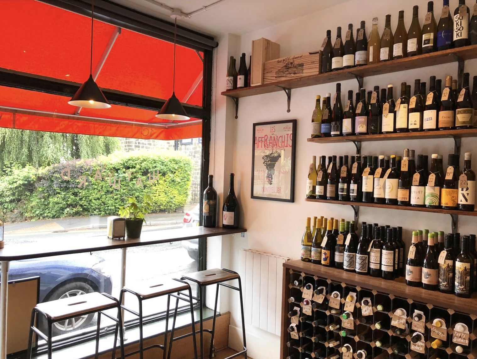 wine shop with a red blind.