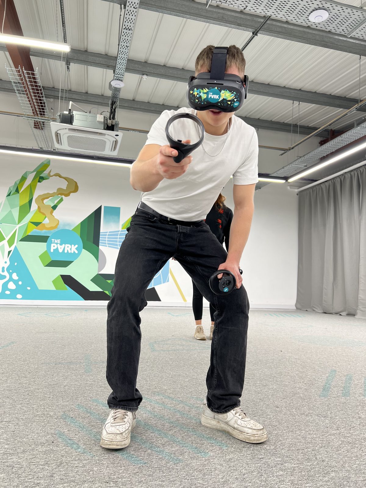 A boy playing a VR game.