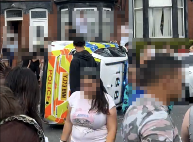 Scenes of the overturned police car in Leeds. Credit: X, @Dylan_laun