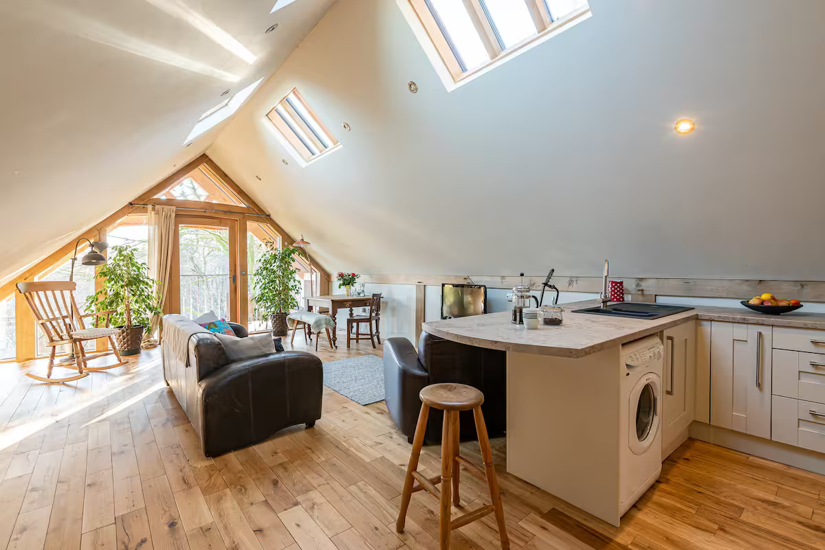 The living space and en-suite bathroom at Chequer Barn Apartment / Credit: Airbnb (via Supplied)