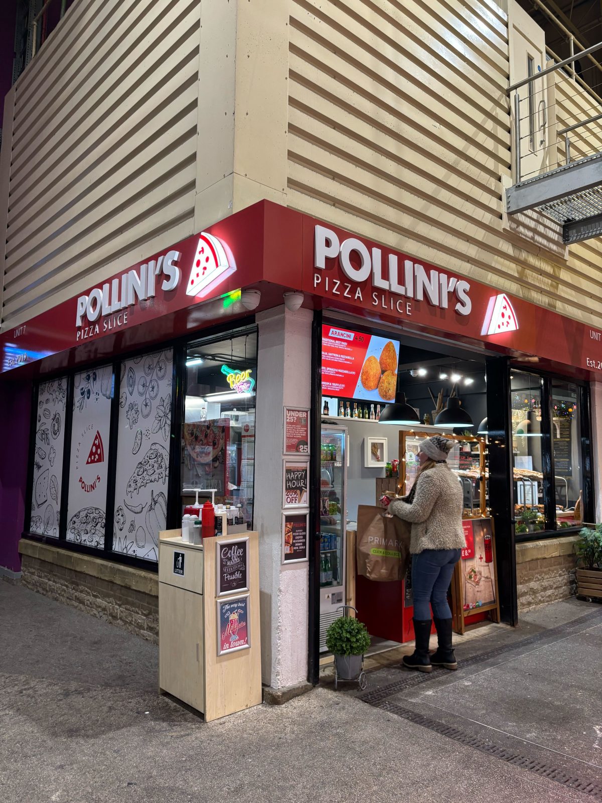 Pollini's Pizza Slice inside Leeds Kirkgate Market. 