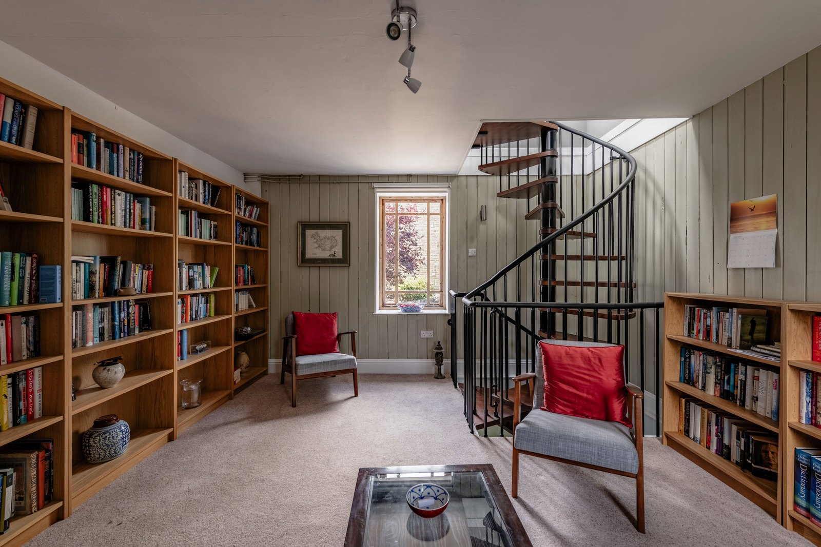 The library is hidden behind a concealed staircase