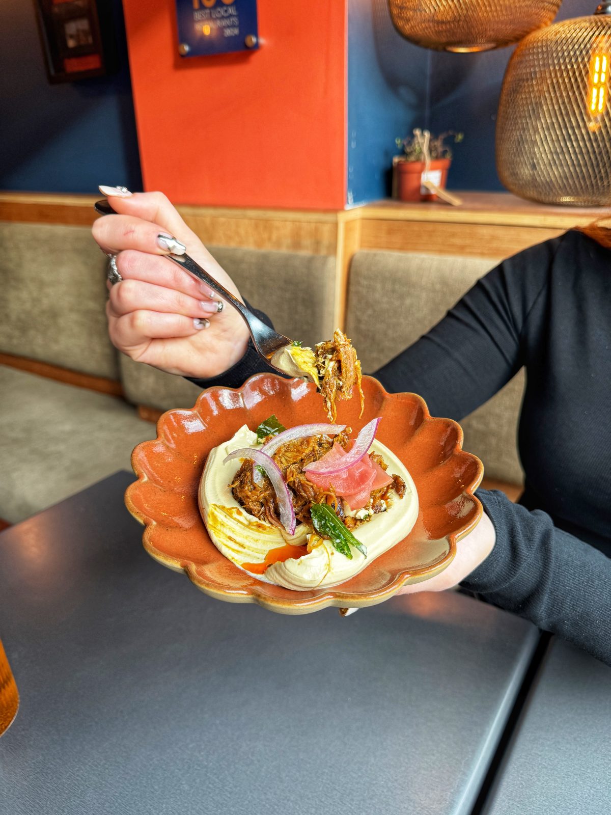 Slow-cooked lamb on hummus